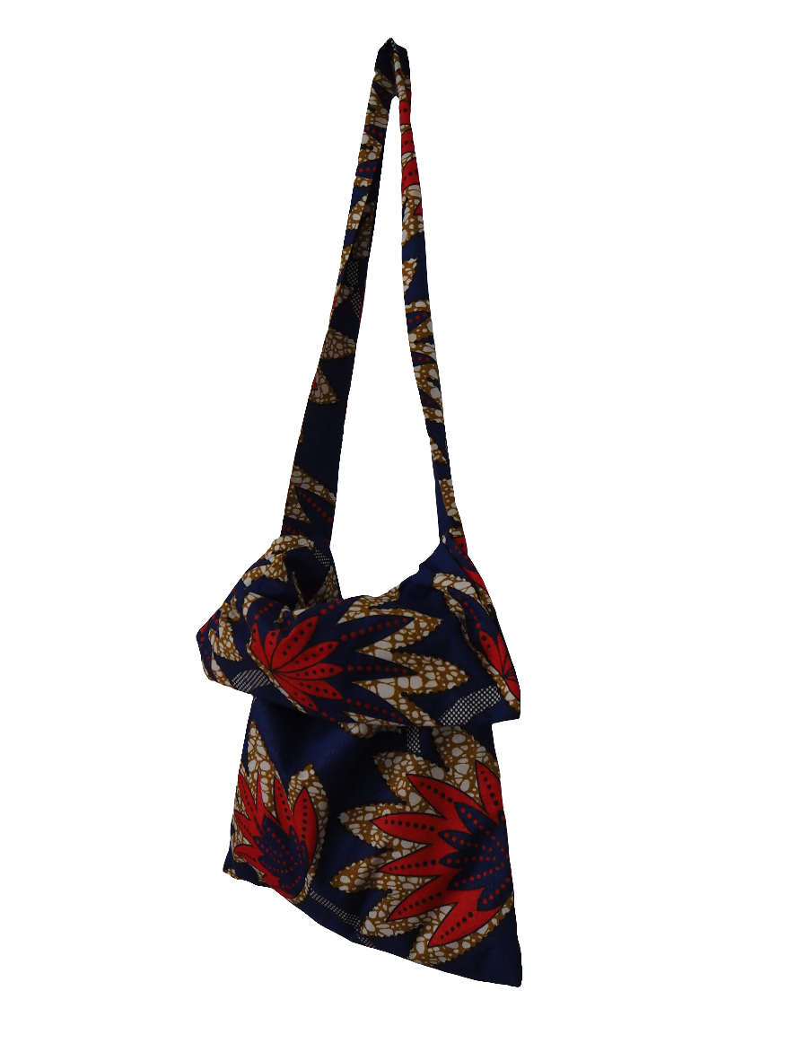 tote bag azul con palmeras rojas llena